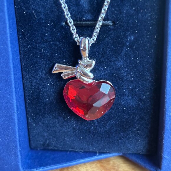Swarovski Ties of Love pendant necklace with a red heart-shaped crystal. - Picture 9 of 11